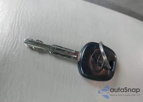 2005 Toyota Corolla Ce z USA, uszkodzony, nr VIN 1NXBR32E65Z539601